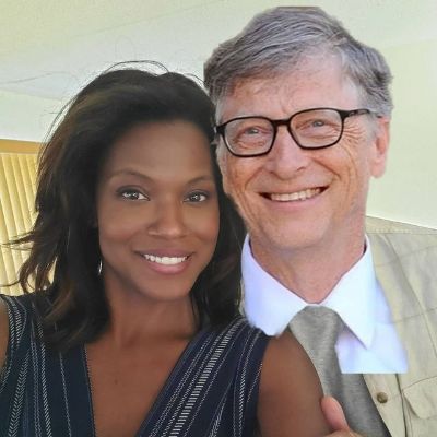 Pic Shows Tom Paul faced changed with Bill Gates and Cassandra Freeman smiling along with him..